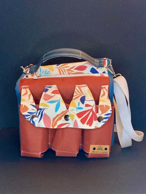 Patterned Shoulder Bag: A versatile shoulder bag designed to carry your daily needs with ease and charm.
