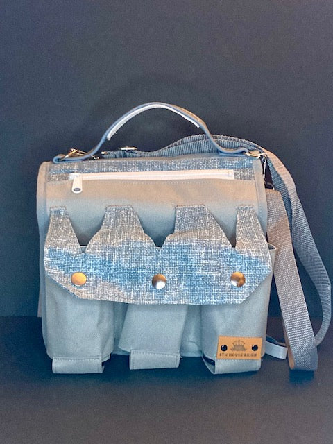 Light Blue/Grey Bag: Sophisticated design meets durability in this medium-sized everyday bag.