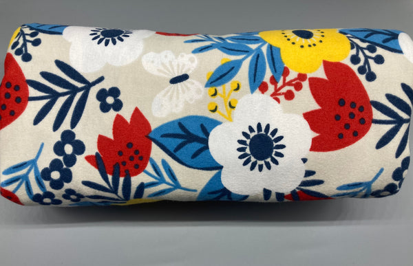 Floral Pouch: Carry your beauty essentials or small items in this elegant, floral-printed pouch.