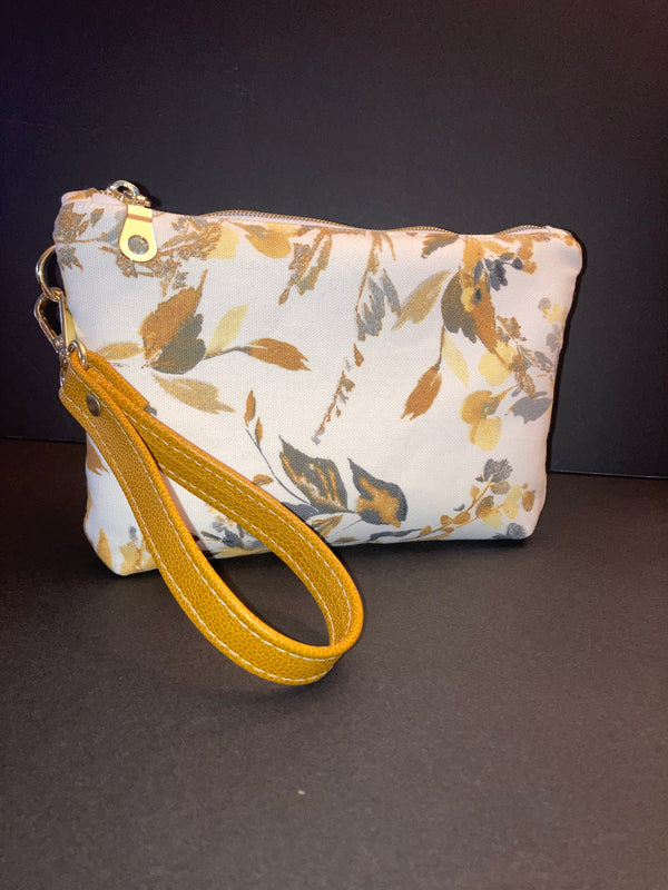 Patterned Wristlet: Designed for convenience, our wristlets keep your most important items close at hand.