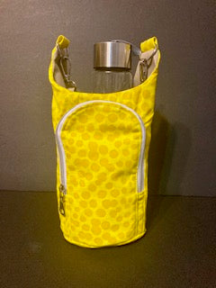 Yellow Patterned Bottle Holder: Brighten up your day with this cheerful yellow bottle carrier.